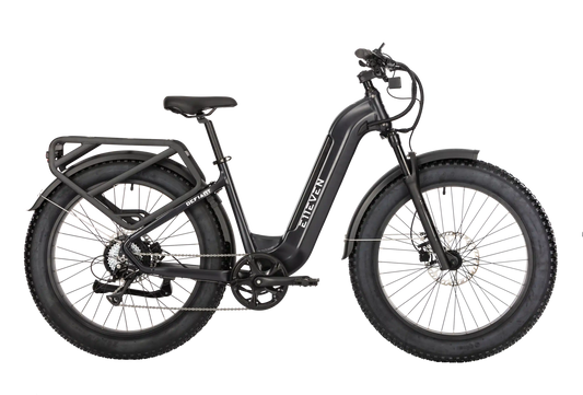 E11EVEN DEFIANT step-through electric bike with fat tires, front suspension, fenders, and rear cargo rack.