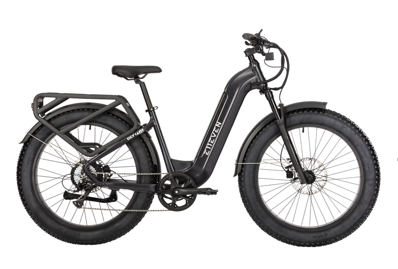 E11EVEN DEFIANT step-through electric bike with fat tires, front suspension, fenders, and rear cargo rack.