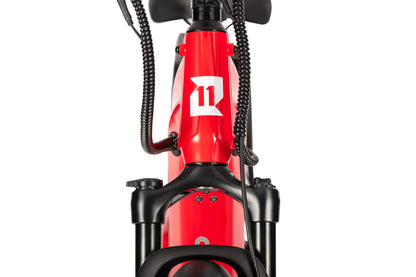 Close-up of the front head badge on the E11EVEN ELEANOR electric bike.
