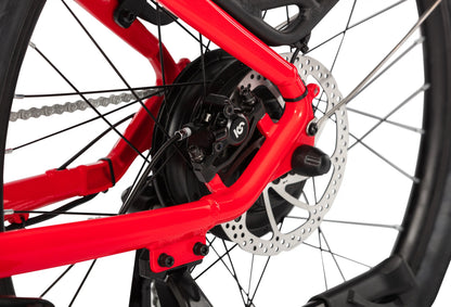 Close-up of the rear disc brake on the E11EVEN ELEANOR electric bike.