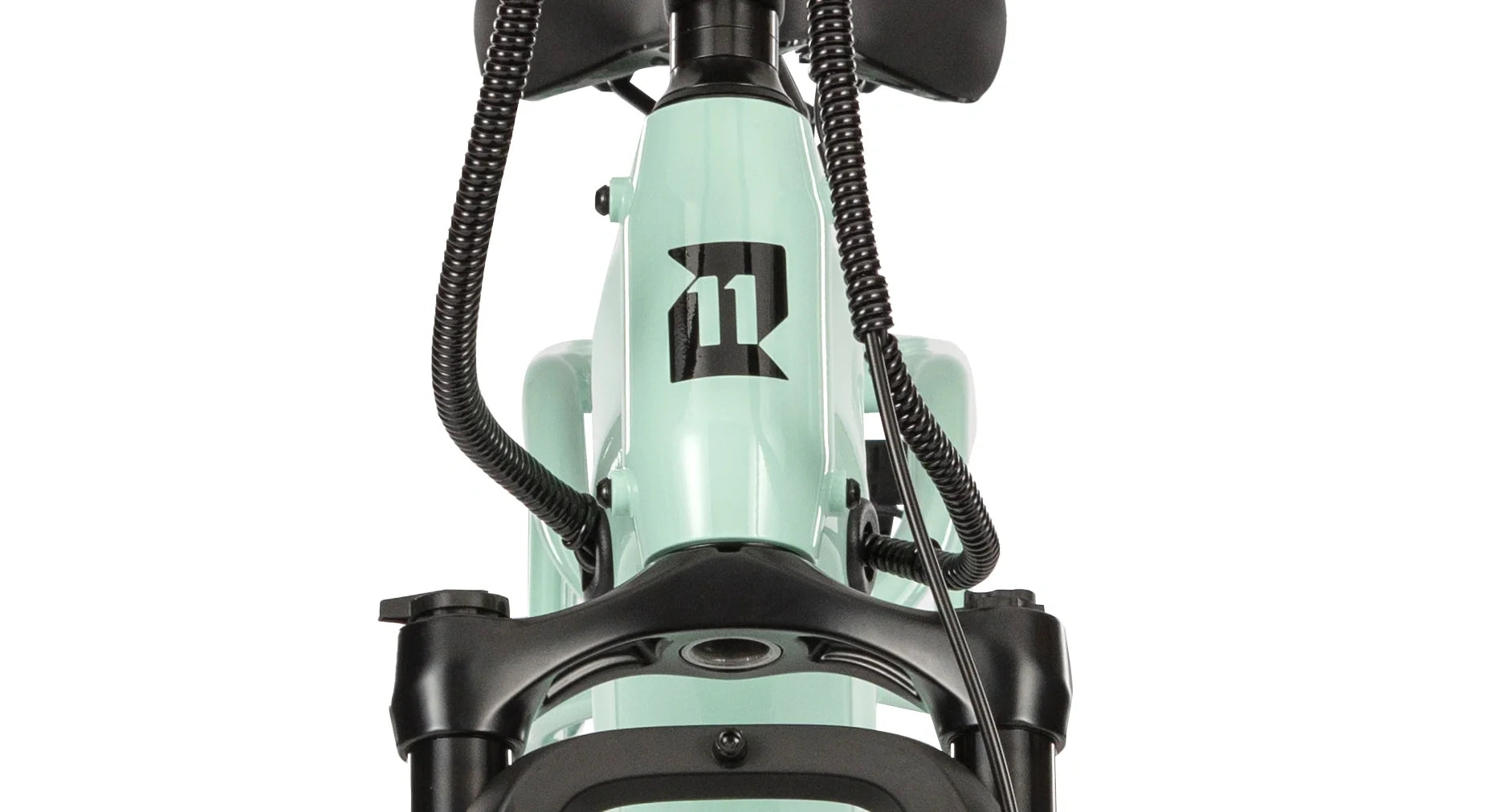 Close-up of the front head badge on the E11EVEN WINGMAN electric bike.