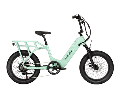 E11EVEN Wingman mint green compact utility ebike side profile with rear rack and fat tires
