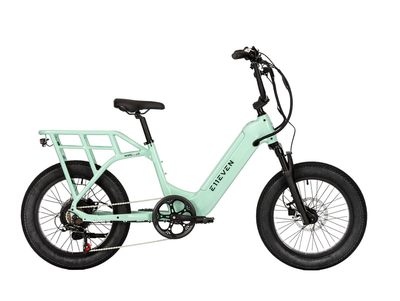 E11EVEN Wingman mint green compact utility ebike side profile with rear rack and fat tires